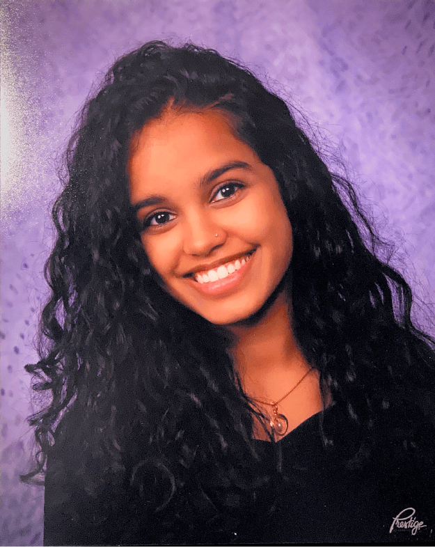 Anushka Tandon. Smiling student in glamorous headshot.