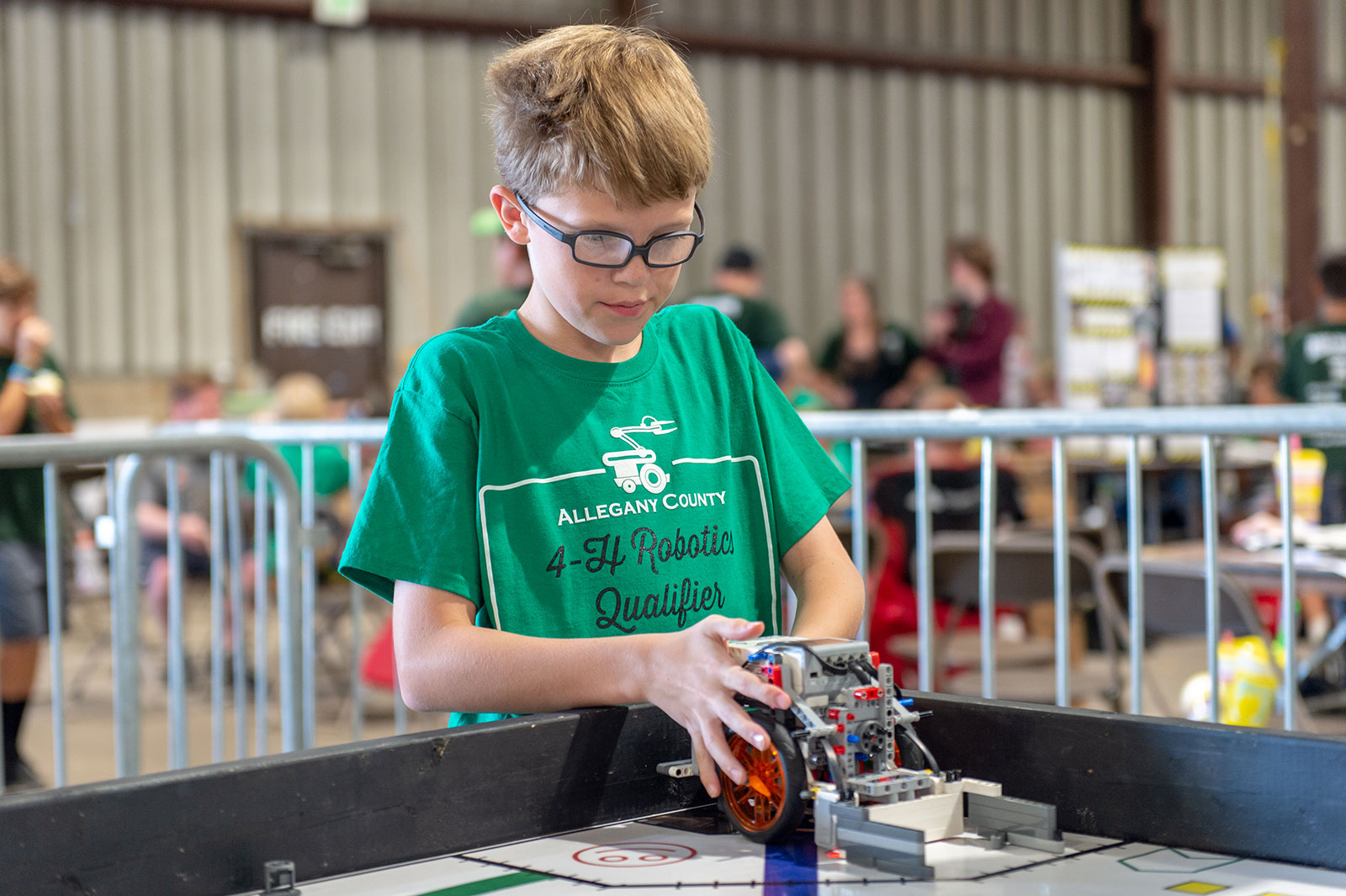 Maryland 4-H kid at a robotics competition