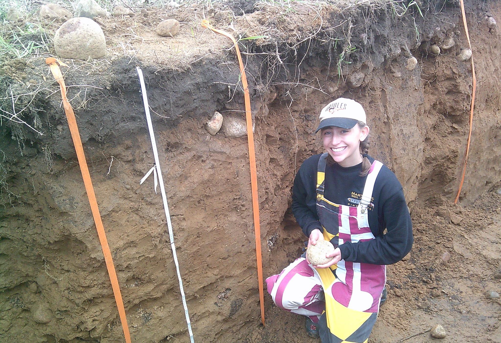 Student in a soil pit