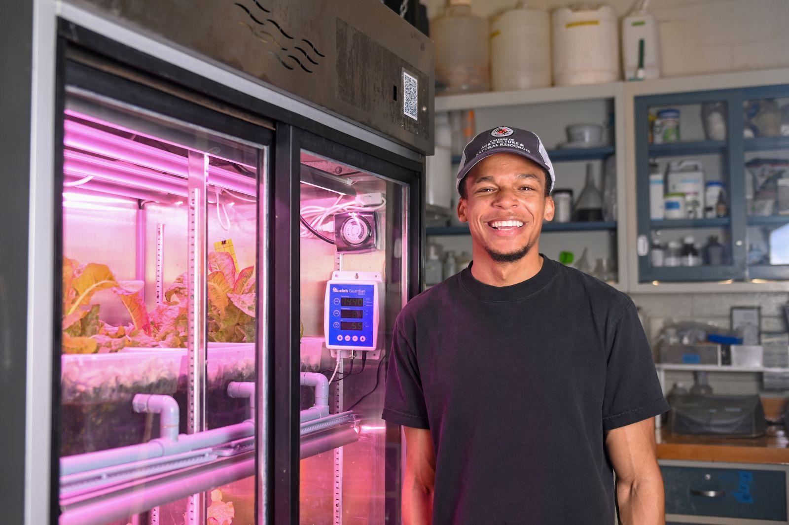 Student in the aquaponics lab