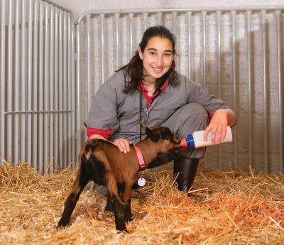 Student with goat