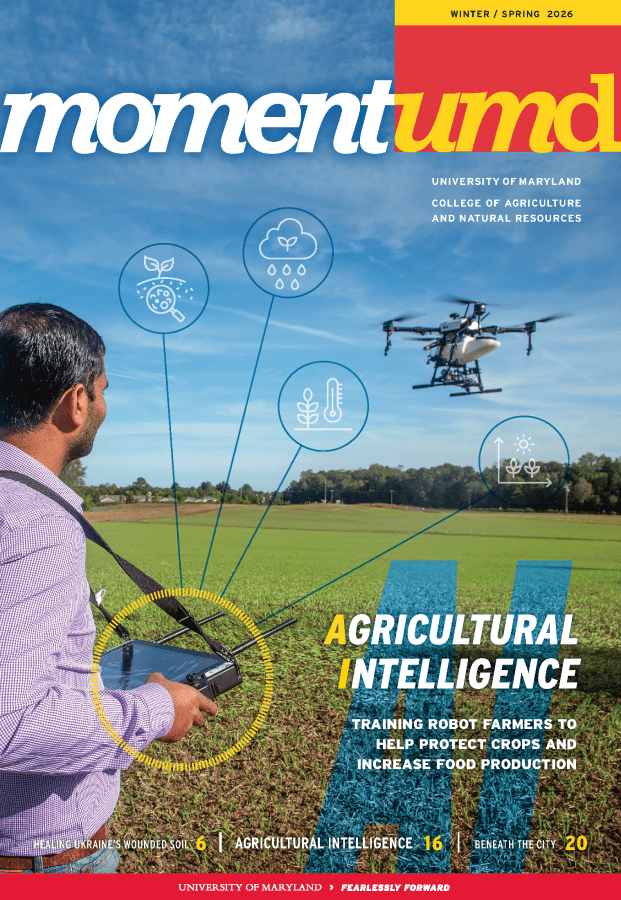 Momentum Magazine cover featuring a researcher flying a drone at a farm