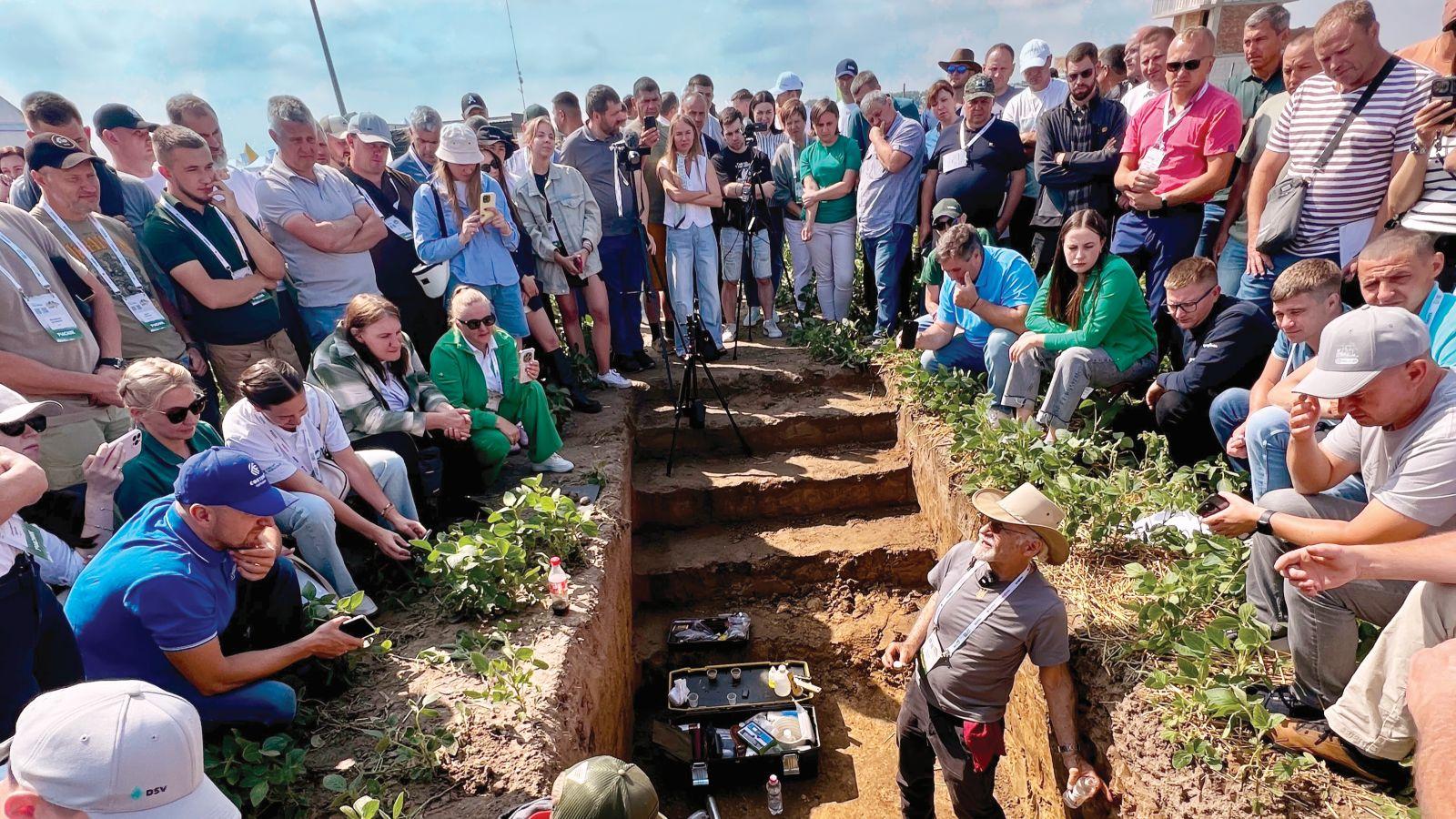Ray Weil presenting one of his “soil pit talks” to hundreds of Ukranian farmers.