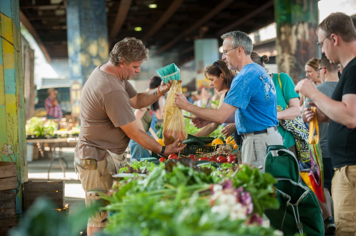 People shopping at farmer's market