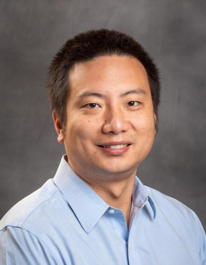 Mengjun Hu